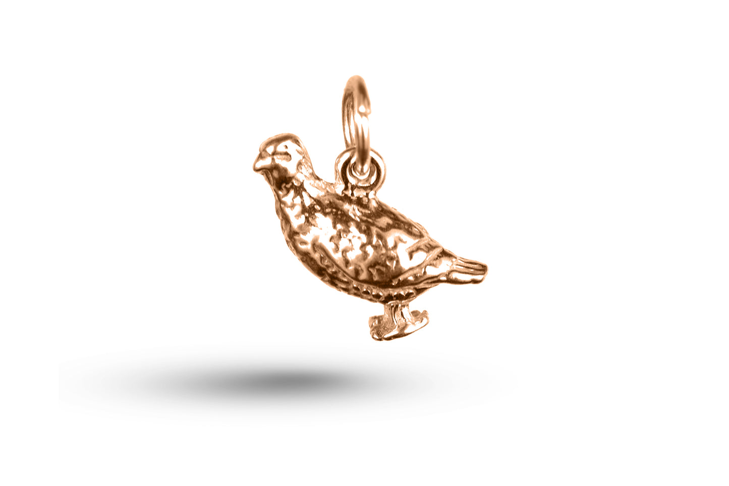 Rose gold Grouse charm.