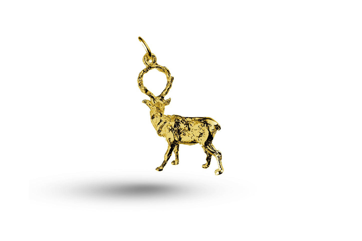 Luxury yellow gold alert stag charm.