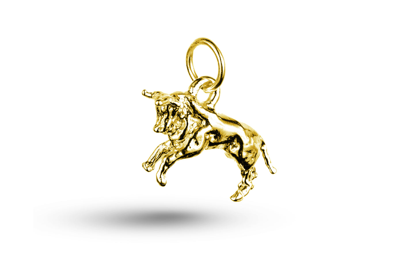 Yellow gold Bull charm.