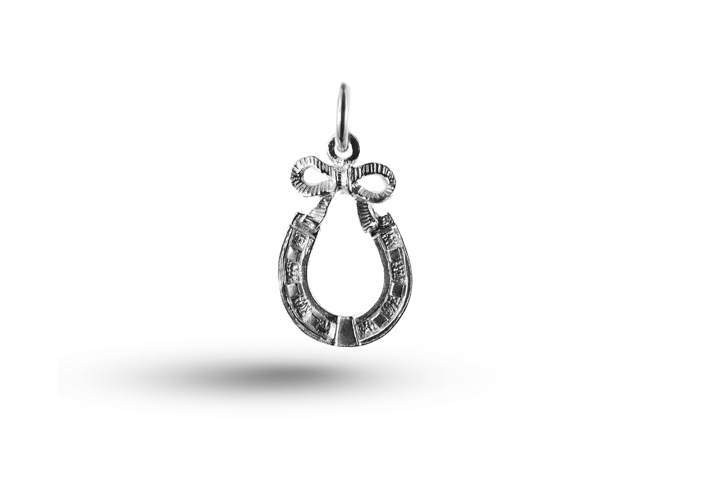 White gold Horseshoe and Bow charm.