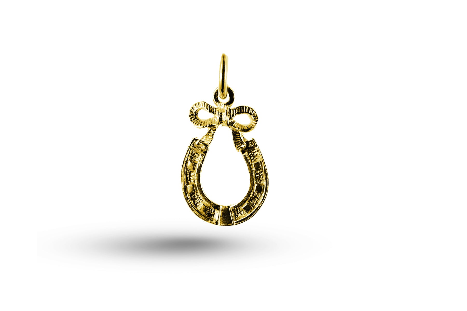 Yellow gold Horseshoe and Bow charm.