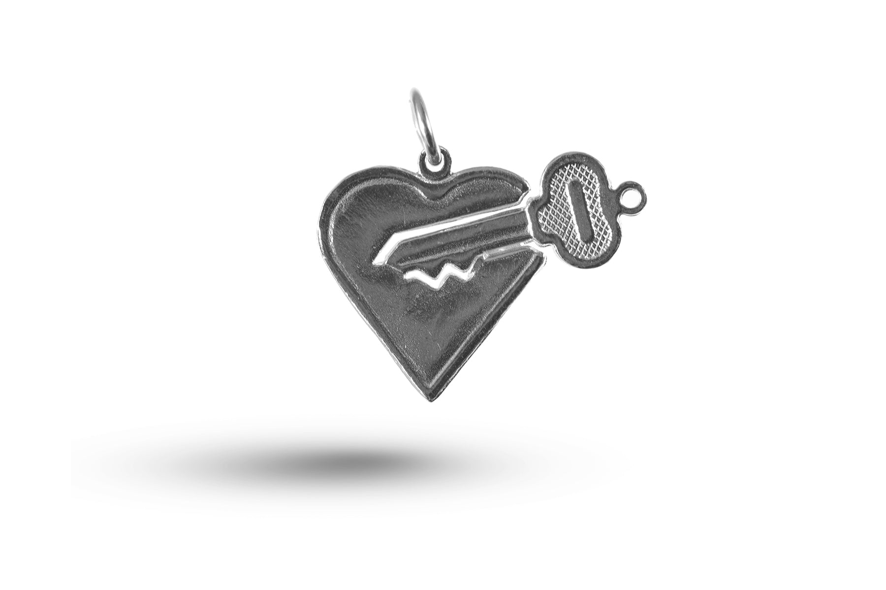 White gold Heart and Key charm.