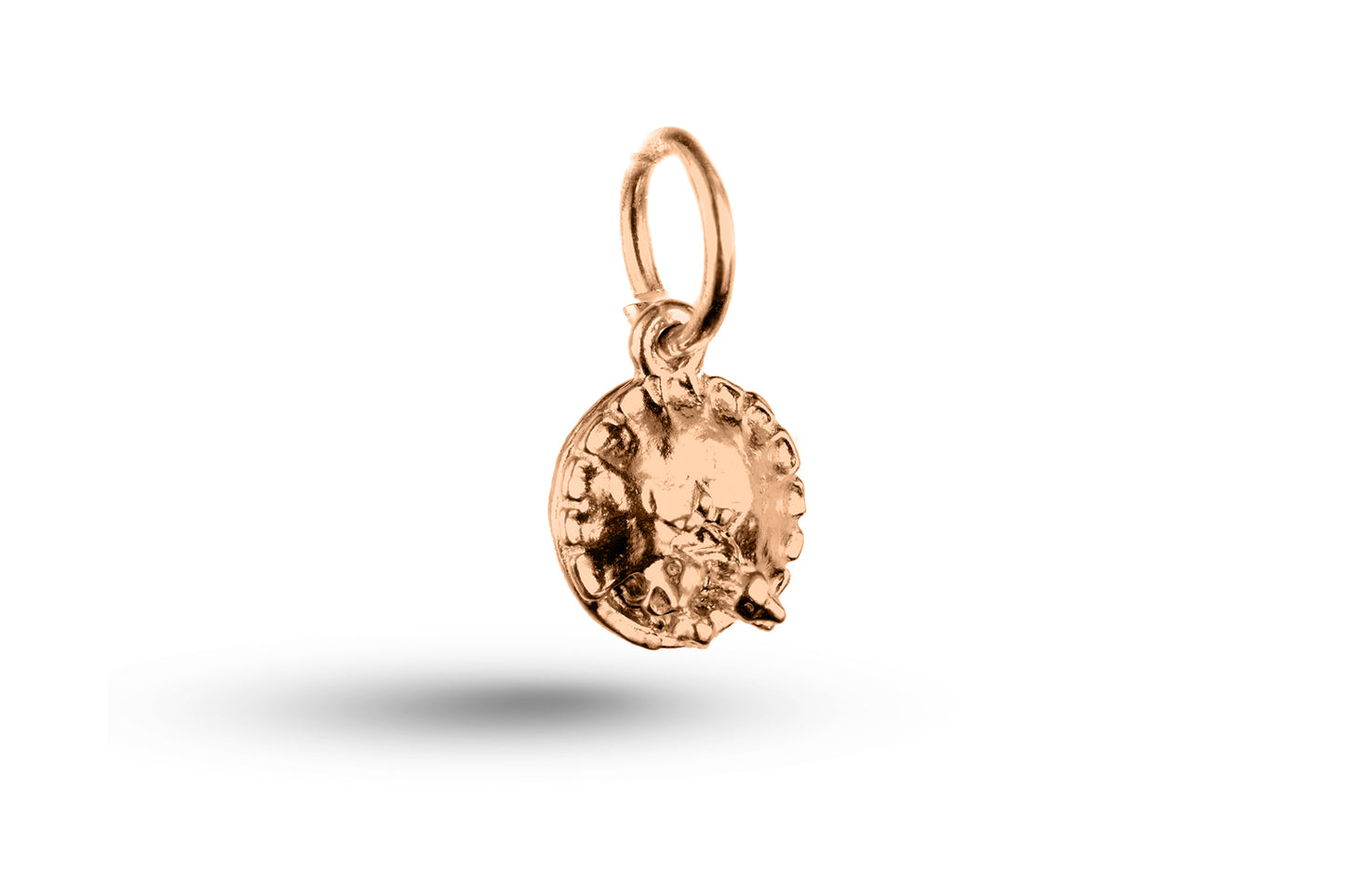 Rose gold Blackbirds in a Pie charm.