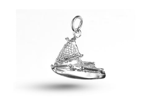 White gold Outrigger charm.