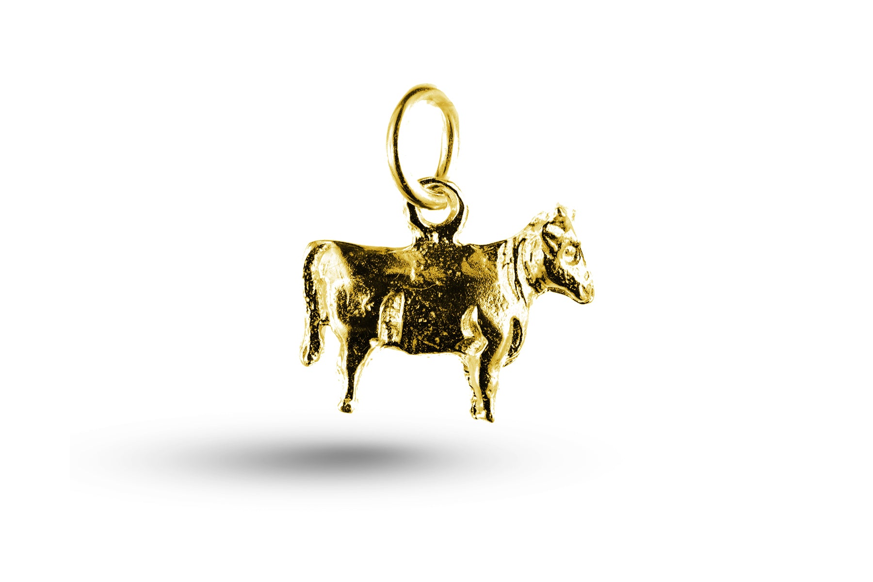Yellow gold Cow charm.