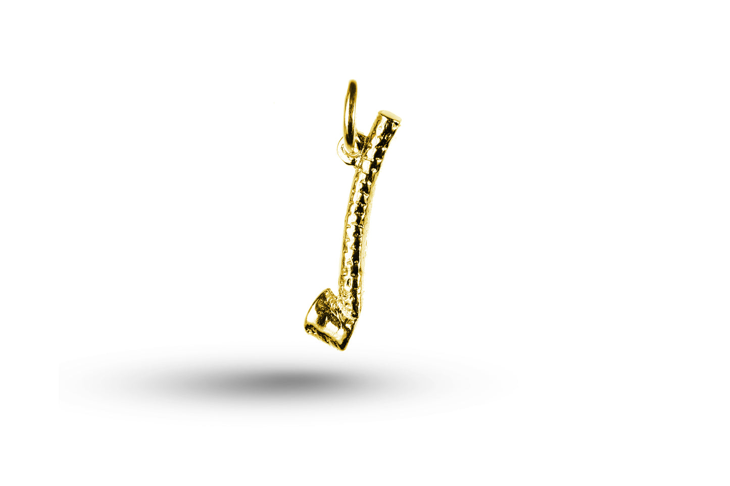 Yellow gold Shelele charm.