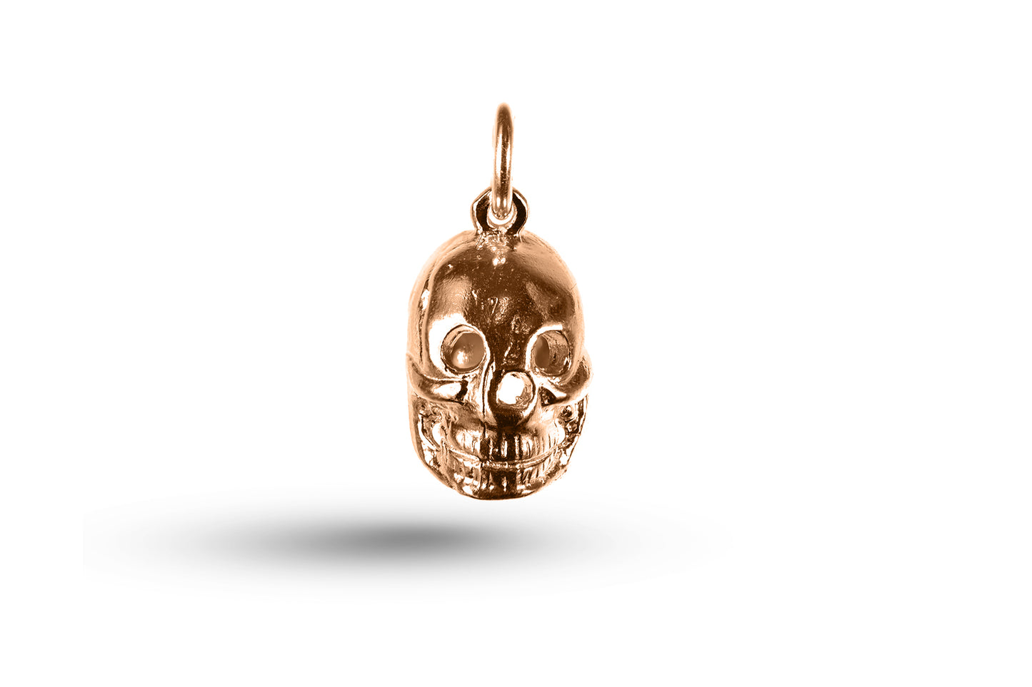 Rose gold Skull charm.