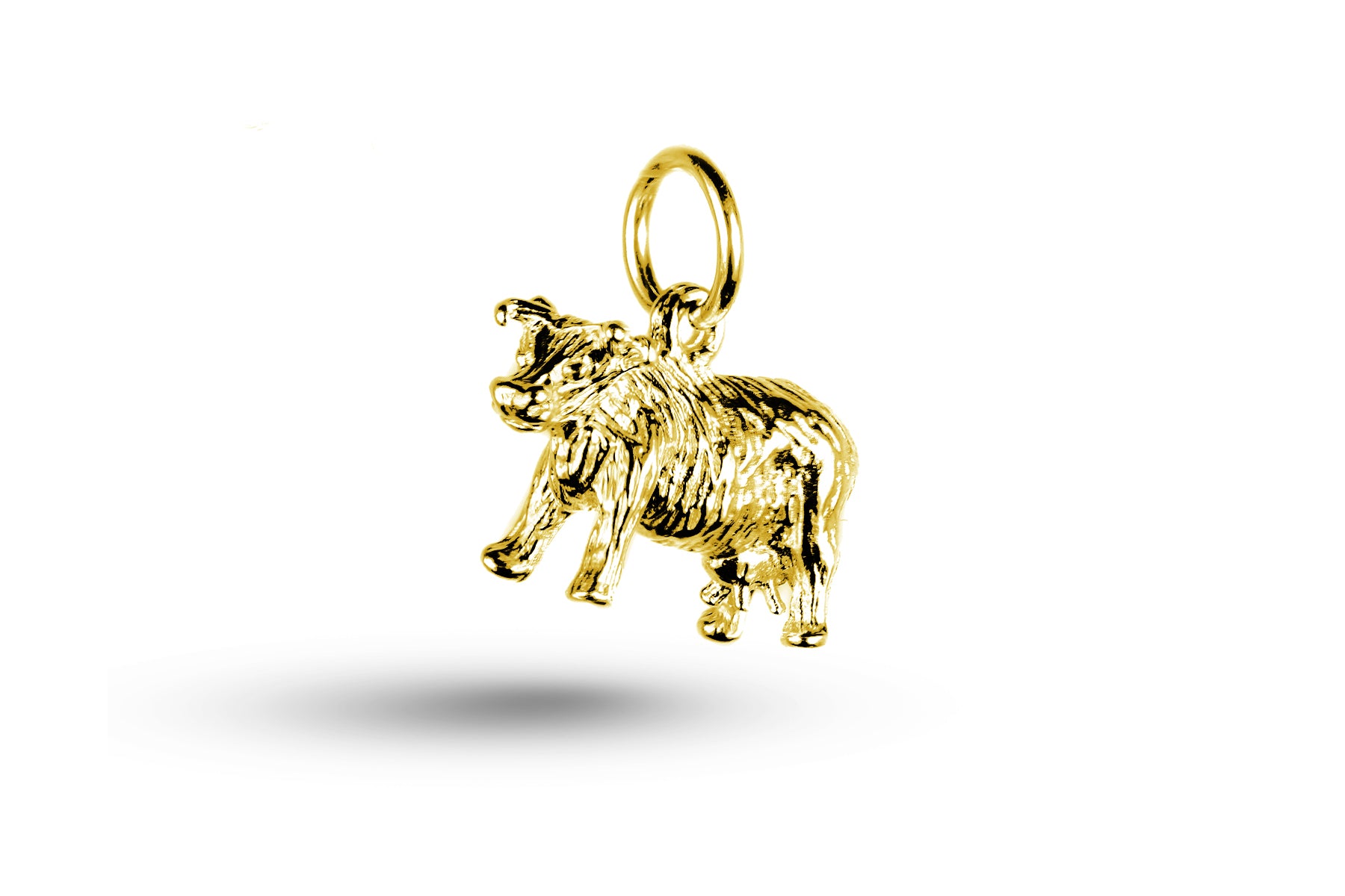 Yellow gold Cow charm.