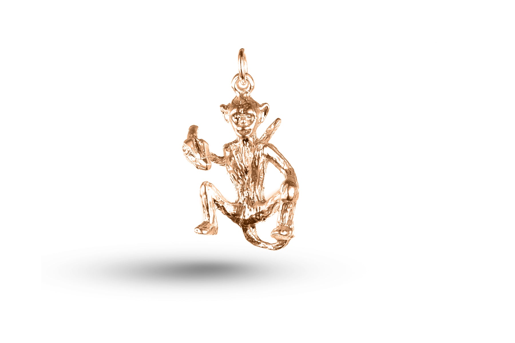 Rose gold Monkey and Banana charm.