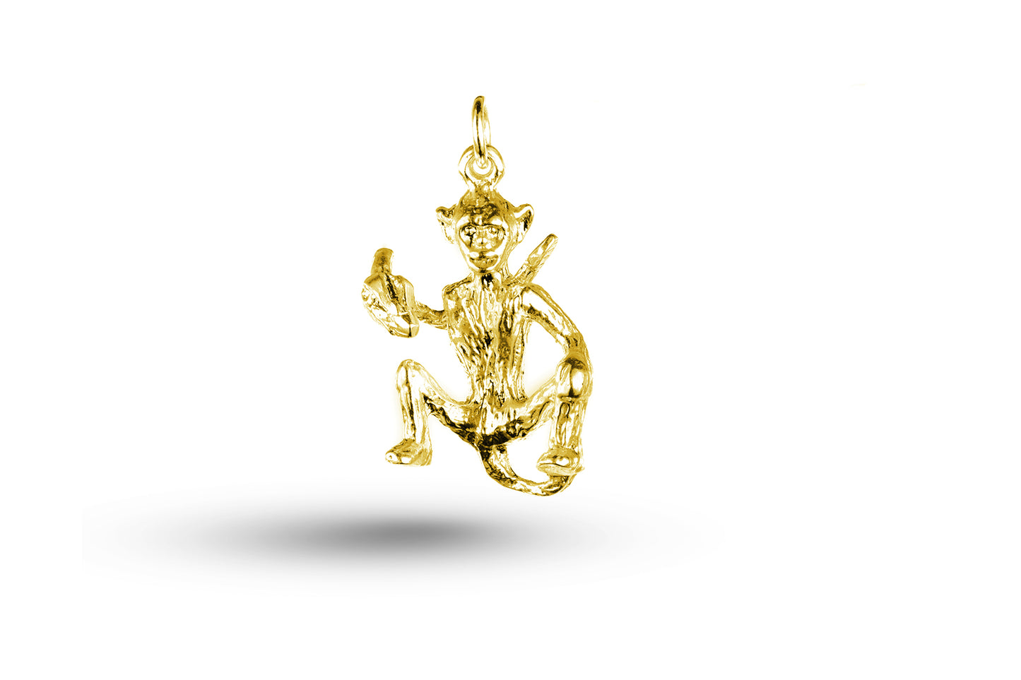 Yellow gold Monkey and Banana charm.