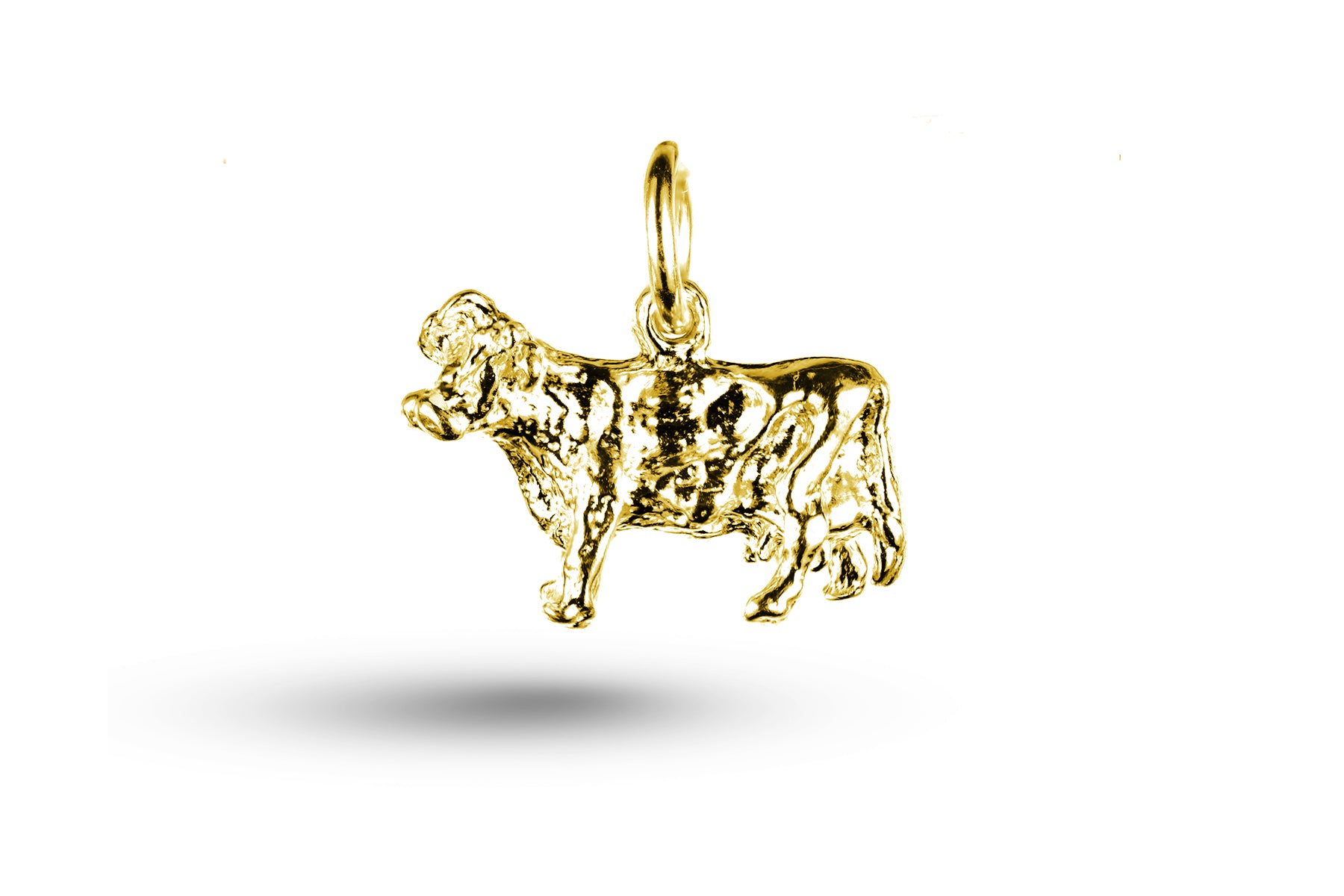 Yellow gold Jersey Cow charm.