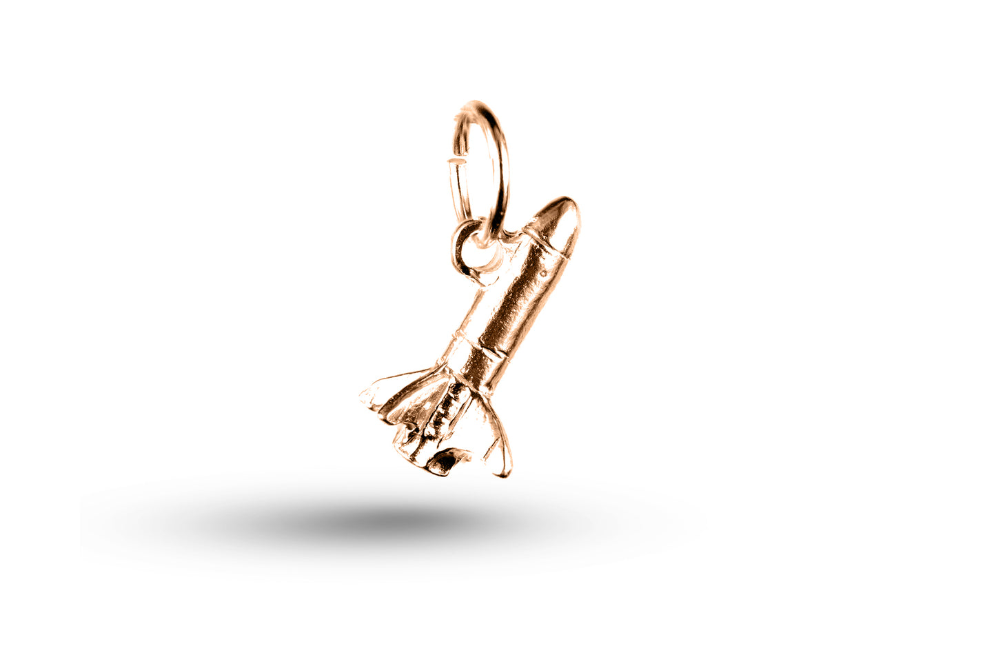 Rose gold Rocket Ship charm.